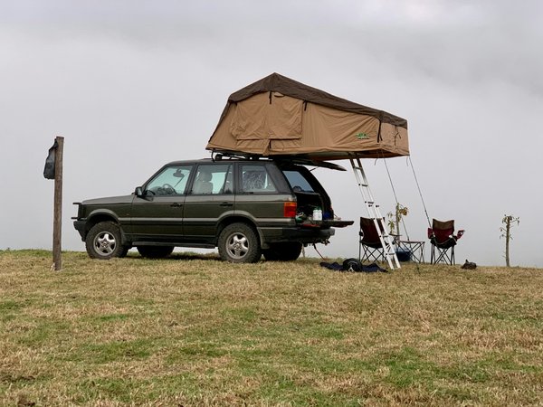 How to plan a camping trip in the UK that includes historic castle tours?